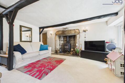 Cosy Lounge with exposed beams and Ingle-nook fireplace