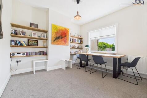 Generously sized lounge with room for dining