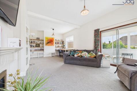 Generously sized lounge with room for dining