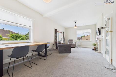 Generously sized lounge with room for dining