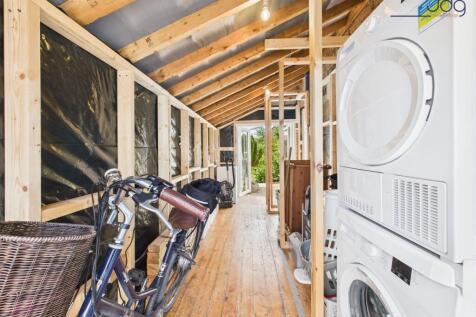 Integrated Garage, used as Utility Space with electricity