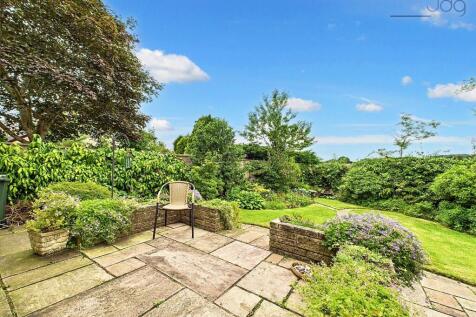 Garden with patio seating area