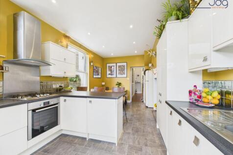 Open plan Kitchen Diner with Wood Fire and Breakfast Bar