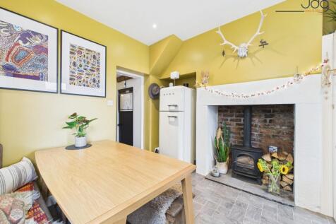Open plan Kitchen Diner with Wood Fire and Breakfast Bar