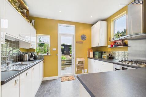 Open plan Kitchen Diner with Wood Fire and Breakfast Bar