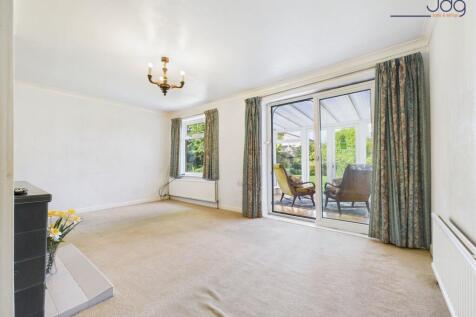 Living Room with patio doors to the Conservatory