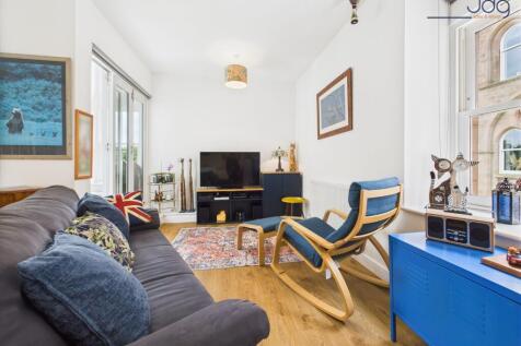 Open Plan Kitchen, Living, Dining with entrance to the balcony