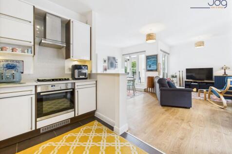 Open Plan Kitchen, Living, Dining with entrance to the balcony
