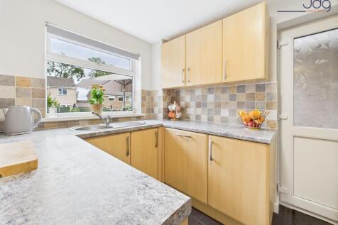 Open Plan Kitchen Diner with access to the Sun Room and the back Garden