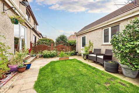 South West Garden with Garage entrance