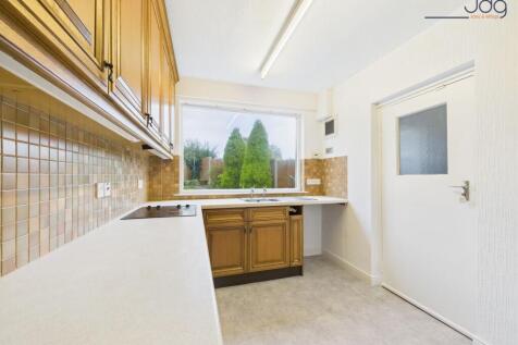 Kitchen with attached pantry