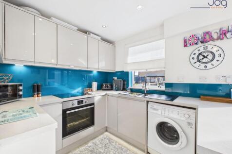 Open Plan Kitchen Diner with Breakfast Bar and bi-folding doors