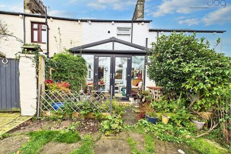 Rear of the property, leading to a separate garden