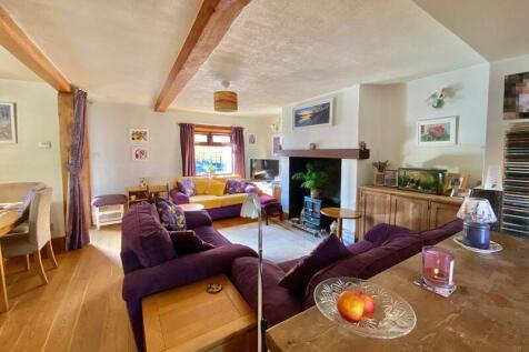The Sitting Room and the Breakfast Area 