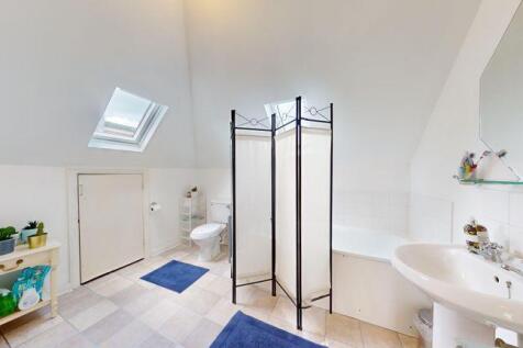 Sizable bathroom with window