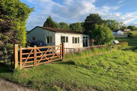 Across the front of the lodge from side.jpg