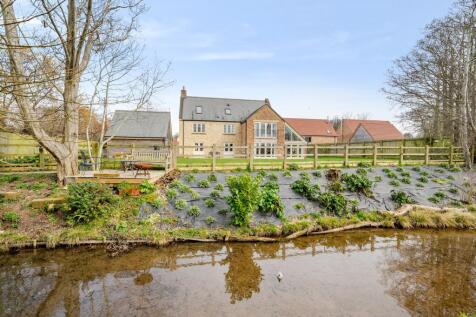 Freshwater pond towards the rear elevation