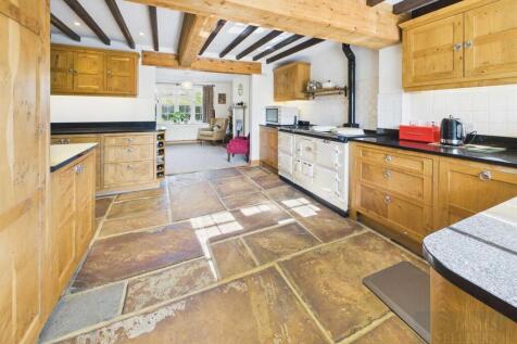L shaped kitchen open to family room