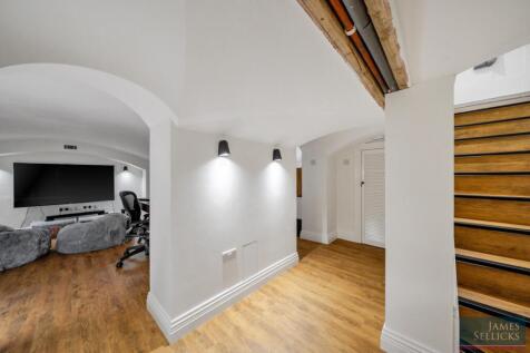 Home office, TV den, and workroom.