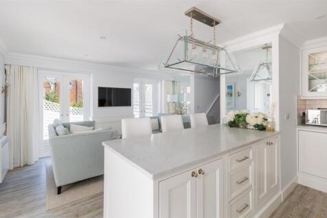 Kitchen opening to Sitting Room