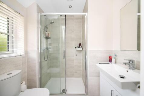 BEDROOM ONE EN-SUITE SHOWER ROOM
