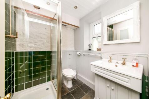 BEDROOM ONE EN-SUITE SHOWER ROOM