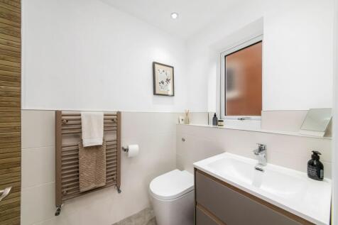 BEDROOM ONE EN-SUITE SHOWER ROOM