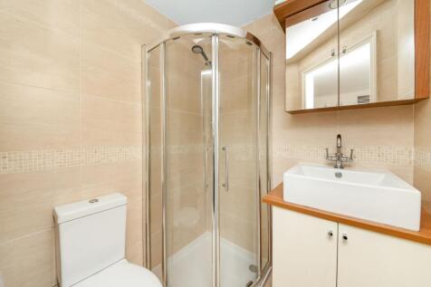 BEDROOM ONE EN-SUITE SHOWER ROOM