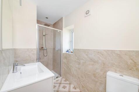 BEDROOM ONE EN-SUITE SHOWER ROOM