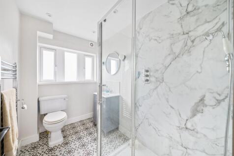 BEDROOM ONE EN-SUITE SHOWER ROOM
