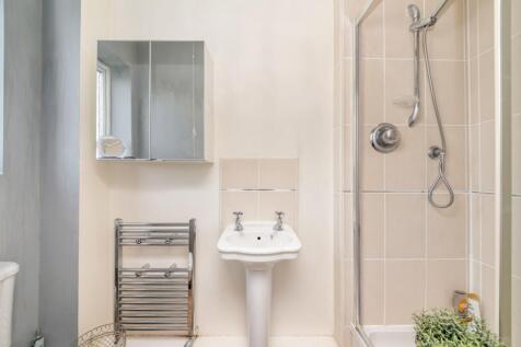 BEDROOM ONE EN-SUITE SHOWER ROOM