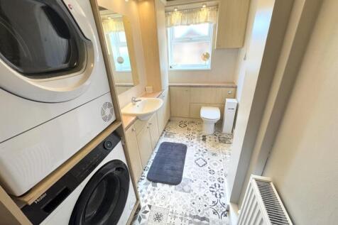 GROUND FLOOR SHOWER ROOM &amp; UTILITY