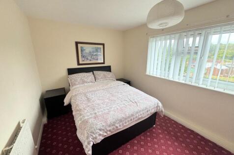 BEDROOM  ( REAR)