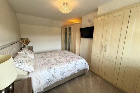 BEDROOM ( REAR)