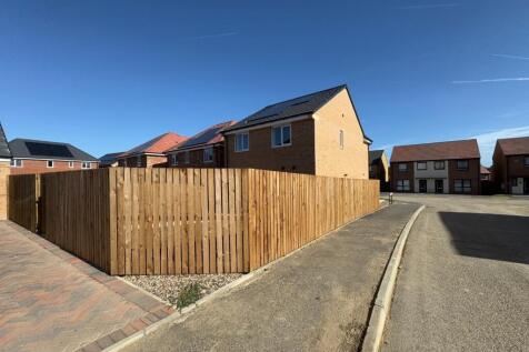 REAR VIEW - DRIVE &amp; GARAGE TO THE REAR