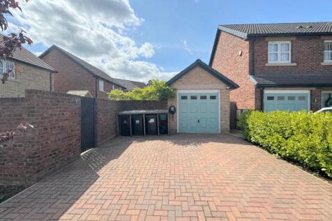 GARAGE AND DRIVE ( TO THE REAR)