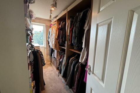 23 - Bedroom 3  Walk-In Dressing Room.jpg