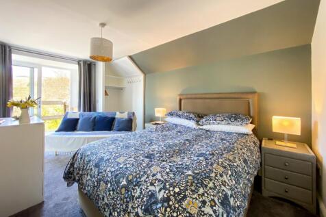 Bedroom With Balcony
