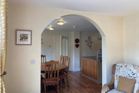 Archway looking in dining area