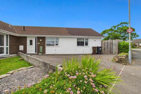 Front of bungalow and driveway