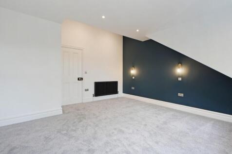 Attic front bedroom (1).jpg