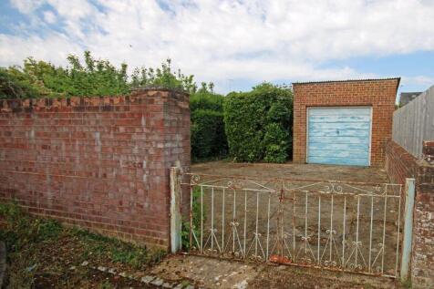Rear access to parking and garage