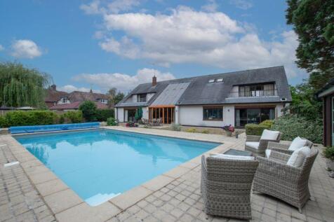 Pool and house