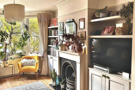 THROUGH LOUNGE/DINING ROOM