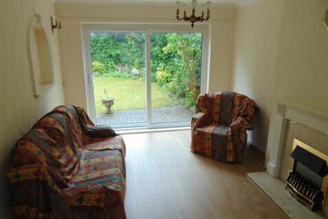 THROUGH LOUNGE/DINING ROOM