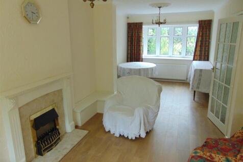THROUGH LOUNGE/DINING ROOM