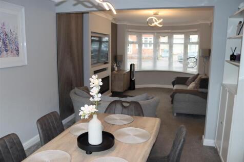 IMPRESSIVE THROUGH LOUNGE/DINING ROOM