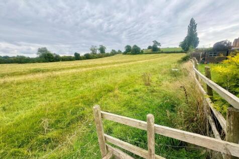Fields to rear