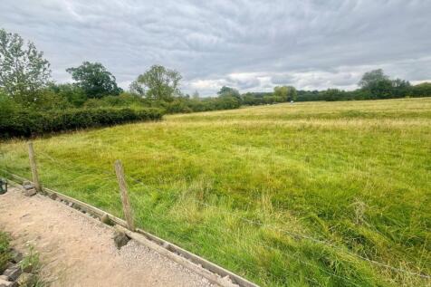 Fields to rear