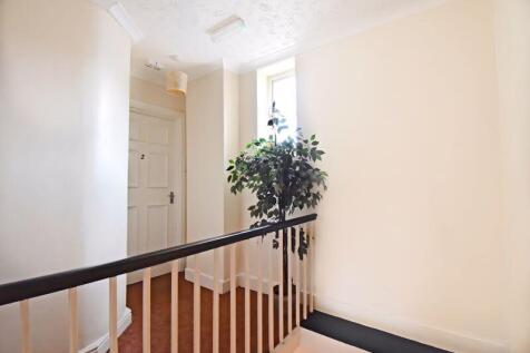Communal hall and entrance to Flat 2